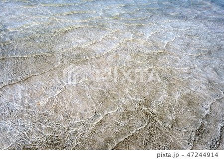 Pattern of sea waves shining in sunlight Pattern of sea waves shining in sunlight 47244914