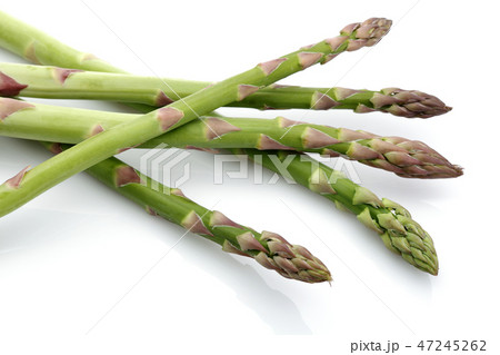Fresh green asparagus on white background Fresh green asparagus on white background 47245262