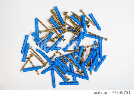Plastic dowel pin or wall plugs on white background 47246751