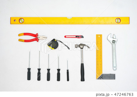 Collection of building implements on white background Collection of building implements on white background 47246763