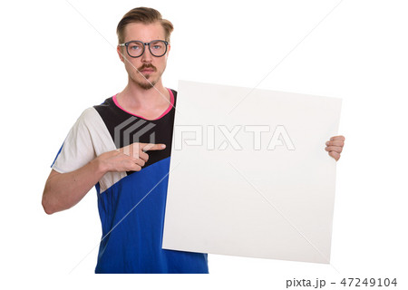 Portrait Of Man Isolated Against White Background Portrait Of Man Isolated Against White Background 47249104