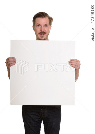 Portrait Of Man Isolated Against White Background Portrait Of Man Isolated Against White Background 47249130
