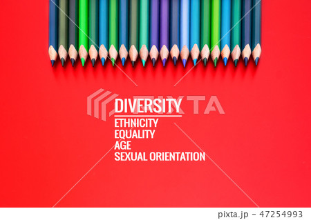 Diversity concept. row of mix color pencil on red 47254993