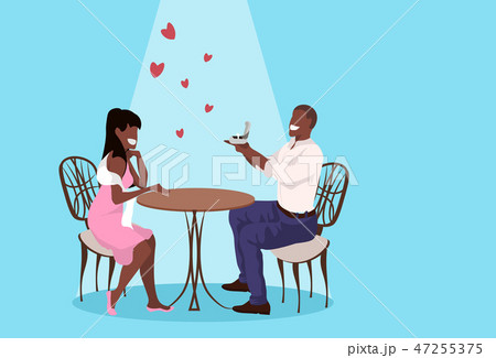 man holding engagement ring proposing to surprised woman marry him happy valentines day concept 47255375