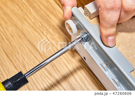 Installation furniture, screwing screw-bolt. 47260606