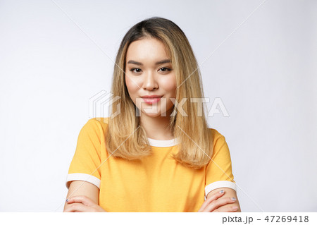 Beautiful asian girl with healthy skin isolated on white background. Lifestyle concept. 47269418