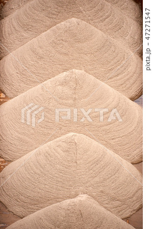 sand transport by boat on river 47271547