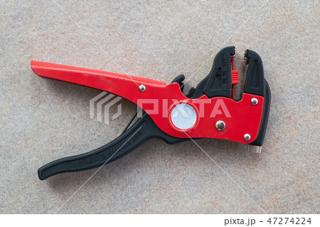 Wire Stripper and Cutter on the Floor. 47274224