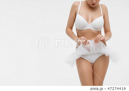 Beautiful sporty woman body. Sexy female slim tanned girl 47274419