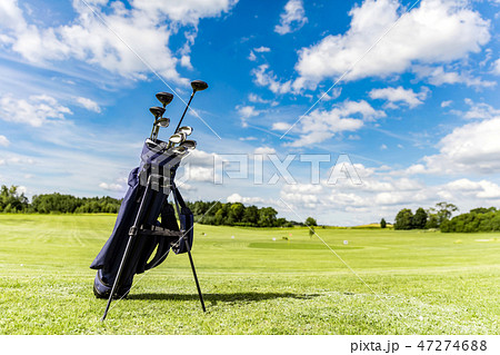 Golf equipment bag standing on a course. Golf equipment bag standing on a course. 47274688