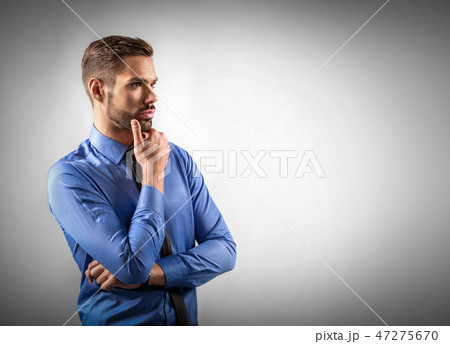 Young businessman thinking about new business ideas 47275670