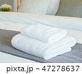 White towels on bed in modern bedroom interior 47278637