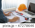 architect working on table with blueprint and tool 47278646
