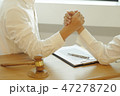 lawyer advises shaking hands. 47278720