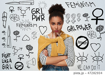 Young woman studio isolated in white crossed arms offended Young woman studio isolated in white crossed arms offended 47282934