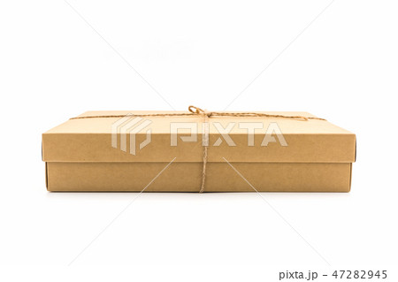 Brown paper box, tied with string Brown paper box, tied with string 47282945