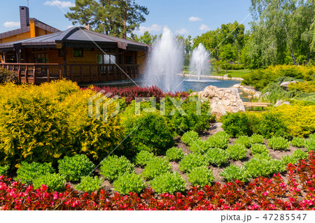 lush high fountains on the lake in the park near t lush high fountains on the lake in the park near t 47285547