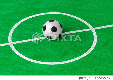 Soccer ball on football field 47285975