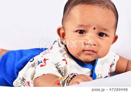 Cute baby sleeping on bed on stomach, Pune Cute baby sleeping on bed on stomach, Pune 47289498