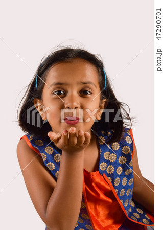 Little girl giving a flying kiss, Pune Little girl giving a flying kiss, Pune 47290701