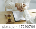 lawyer advises shaking hands. 47290709
