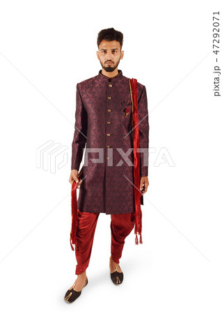 Handsome boy in Indian traditional attire posing 47292071