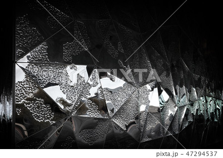 Abstract background of black shiny metalic polygonal shapes 47294537