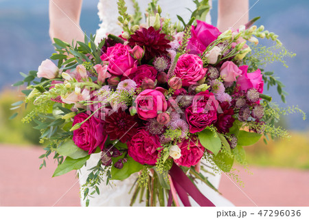 bright bouquet of various red and pink flowers bright bouquet of various red and pink flowers 47296036