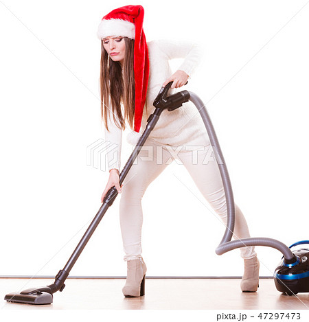 Girl santa claus hat with vacuum cleaner Girl santa claus hat with vacuum cleaner 47297473