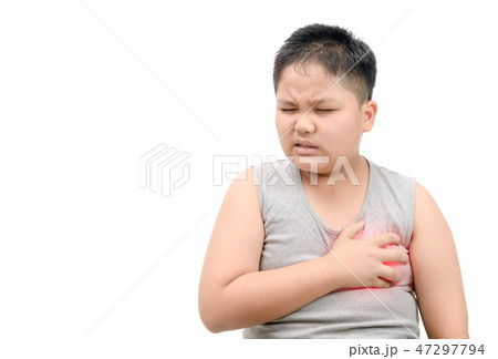 Obese fat boy clutching his chest from acute pain Obese fat boy clutching his chest from acute pain 47297794