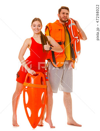Lifeguards with rescue ring buoy and life vest. Lifeguards with rescue ring buoy and life vest. 47298022