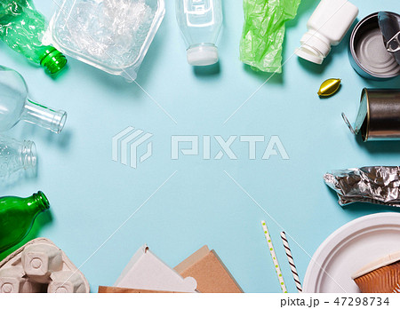 Household waste on a blue background. T 47298734