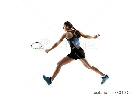 Full length portrait of young woman playing tennis isolated on white background 47301035