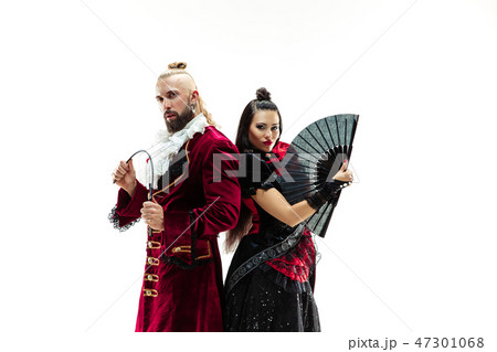 The young man wearing a traditional medieval costume of marquis and woman as marquise 47301068