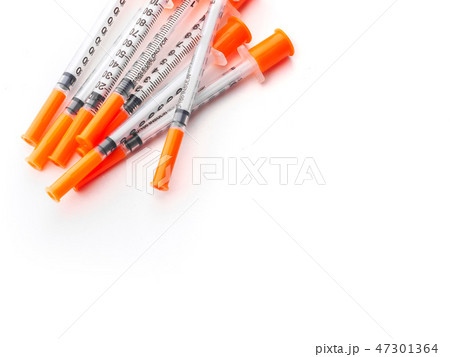 Several insulin syringes for for injection white isolated background Several insulin syringes for for injection white isolated background 47301364