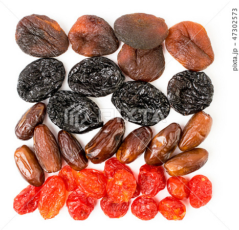 Background of dried apricots, prunes, dogwood and 47302573