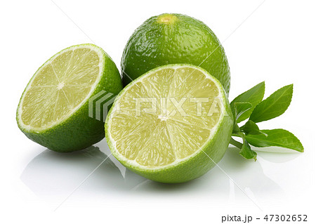 Sliced fresh lime fruits with leaves 47302652