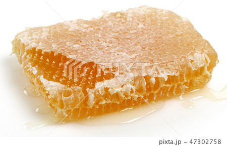 Honeycomb on white background Honeycomb on white background 47302758