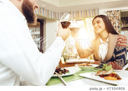 Romantic dinner happy men and women in restaurant 47304909