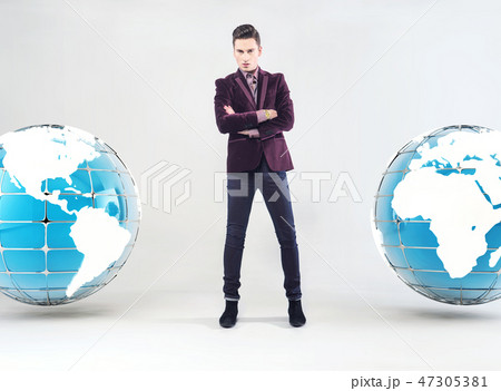 Young businessman and Earth globe 47305381