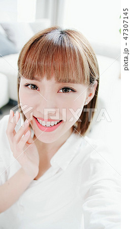 woman selfie with teeth retainer woman selfie with teeth retainer 47307145