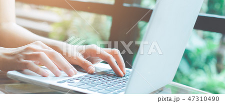 Business woman hand working with a laptop computer Business woman hand working with a laptop computer 47310490