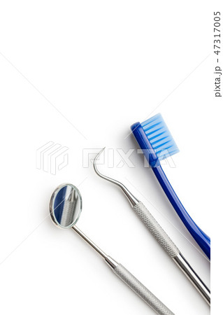 Dental instruments. Dentists tools and toothbrush. 47317005