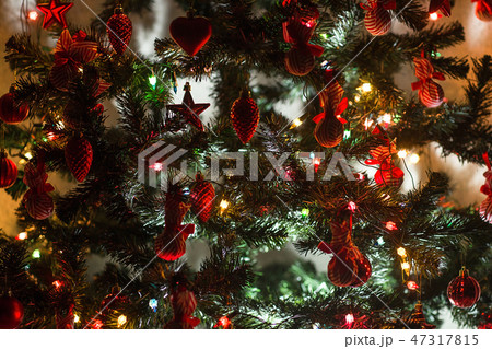decorated with baubles and garlands 47317815
