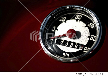 Retro speedometer of a red moped Retro speedometer of a red moped 47318418