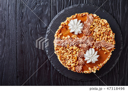peanut cake topped with cream, top view 47318496
