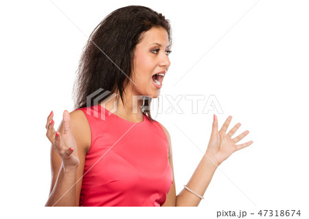 Angry mixed race woman screaming. 47318674