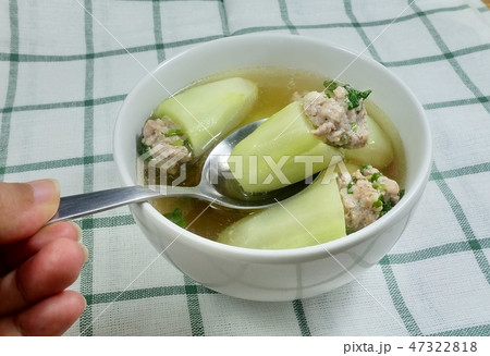 Clear Soup of Cucumber Stuffed with Minced Pork Clear Soup of Cucumber Stuffed with Minced Pork 47322818