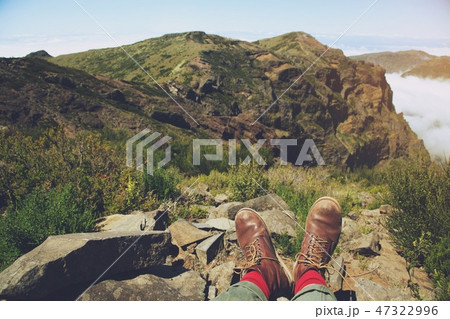 Traveler resting man hipster hiking boots Traveler resting man hipster hiking boots 47322996