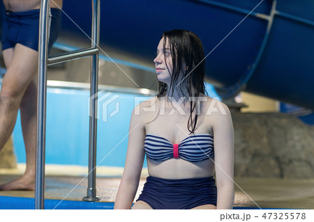 Young woman in aqua park 47325578
